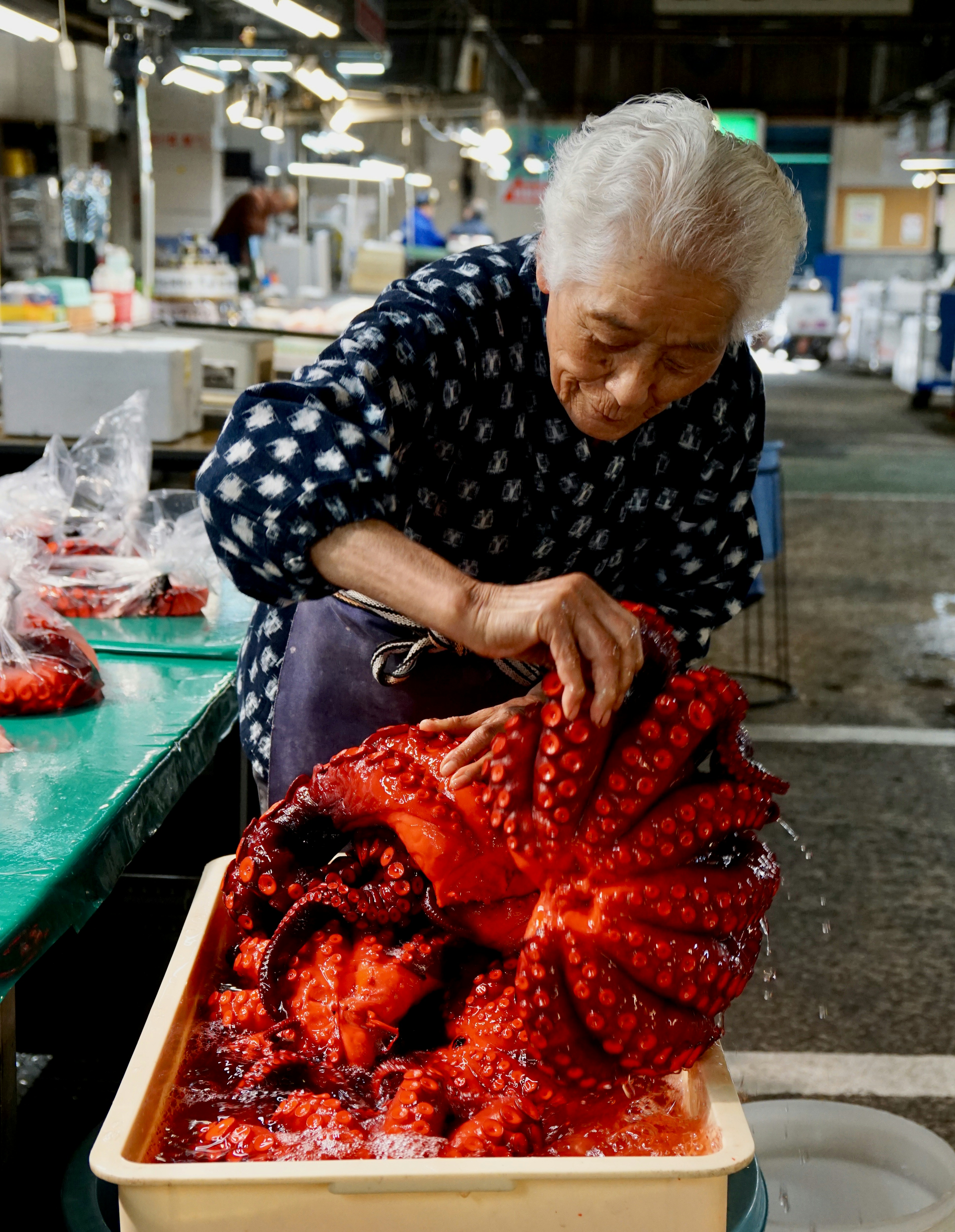 Woman holding octopus